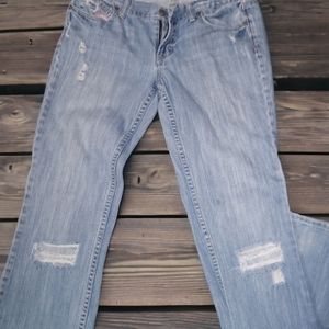 Pink distressed jeans